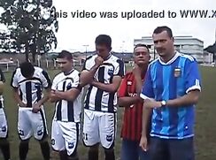 Footy team adjusting cock and balls