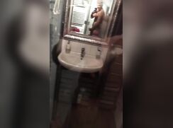 Blond boy wanks in shower