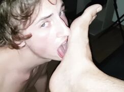 Blond slave worships his master's feet