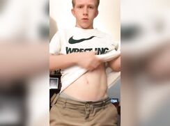 Orange  headed twink strip tease dancing