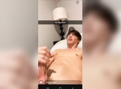 Guy jerks dick in bedroom