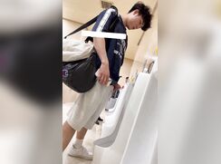 super hot asian boy pissing at urinal with cut dick