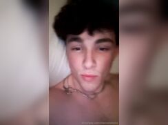 cute curly brunette talking about his huge cumshot