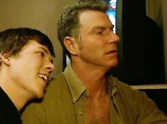 Dad and boy sharing dick at glory hole