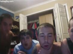 A group of friends show their cocks