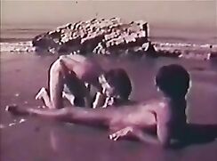 Vintage USA porn excerpt: On the beach