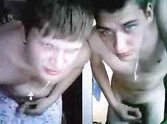 2 russian friends showing their cocks