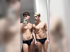 Two young muscular boys having fun