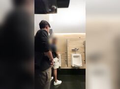BOYS PLAYING IN A PUBLIC BATHROOM