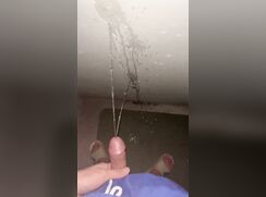 chinese boy tries to pee with hard dick
