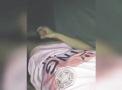 young_people_wearing_soccer_jerseys_squirm