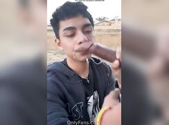 Latino eats his breakfast outside