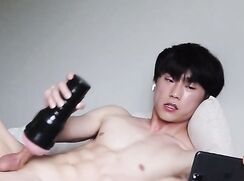 korean boy pretends to facetime while he jerks off