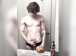 twink fit jock fucks plastic pussy in bathroom cums
