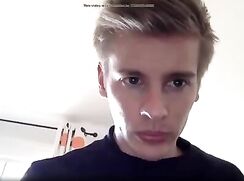 Jerking off his uncut cock