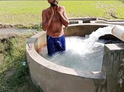 Pakistani villager with semihard dick in tubewell