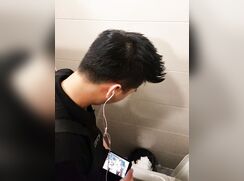 spy chinese guy watching porn and jerking