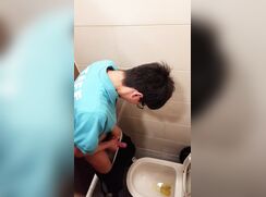 nerdy boy rubs one out after pissing