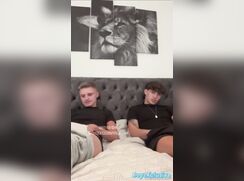 2 sexy boys jerking each other off in bed