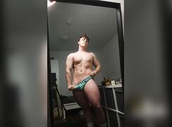 Uncut twink at mirror
