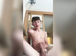 Sunglasses on head boy wanks and cums