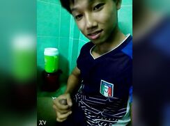 vietnam lad enjoying his footy shirt