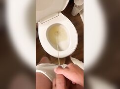 Pissing in toilet