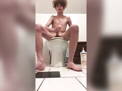 Curly Twink jerks at bathroom