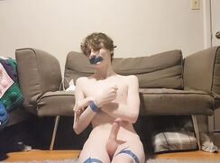 Tied boy pleasuring himself