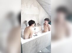 cute nick bryce and friend sharing a watermelon