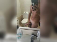 Cute dude jerking dick while watching tv
