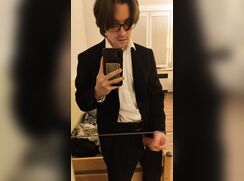 Young lad jerks off in a suit