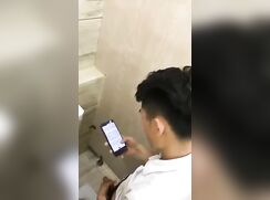chinese man wanking in toilet