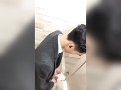 chinese guy in formal attire spy