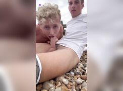 Couple have beach blowjobs