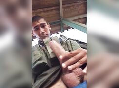 Cute soldier takes time to play with his big cock