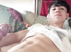 Twink holds his cock till he squirts