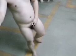 Walking naked in the underground garage