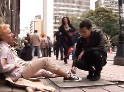 Happiness is helping a poor streetboy