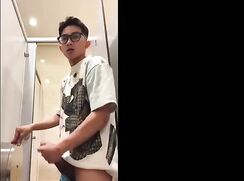Big dick handjob in public restroom