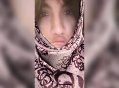 Twink sucks dildo in hijab