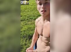 Sporty boy wanks outside