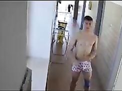 Locker-room spycam: Dishabille in the corridor