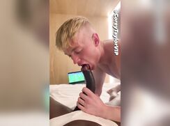 Corey doesn't hold back to enjoy sucking a big black cock!