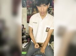 Handsome, strong jaw twink jerking-off on his knees