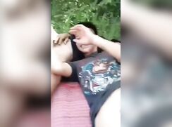 Best friends stop at the park on their way home