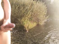 AHV-HD - Twink with hairy pubes wanks his dick, cums on the river and his sperm float