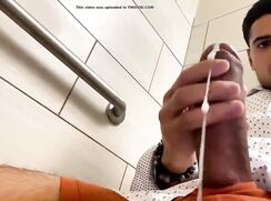 Big dicked guy wanks and cums