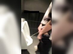 Handsome chinese peeing caught