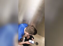 Spying on guy watching porn in restroom